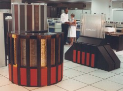 William Harris and a colleague with a Cray2 supercomputer at LLNL.