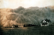 Photo of a dust storm approaching Stratford Texas  in 1935