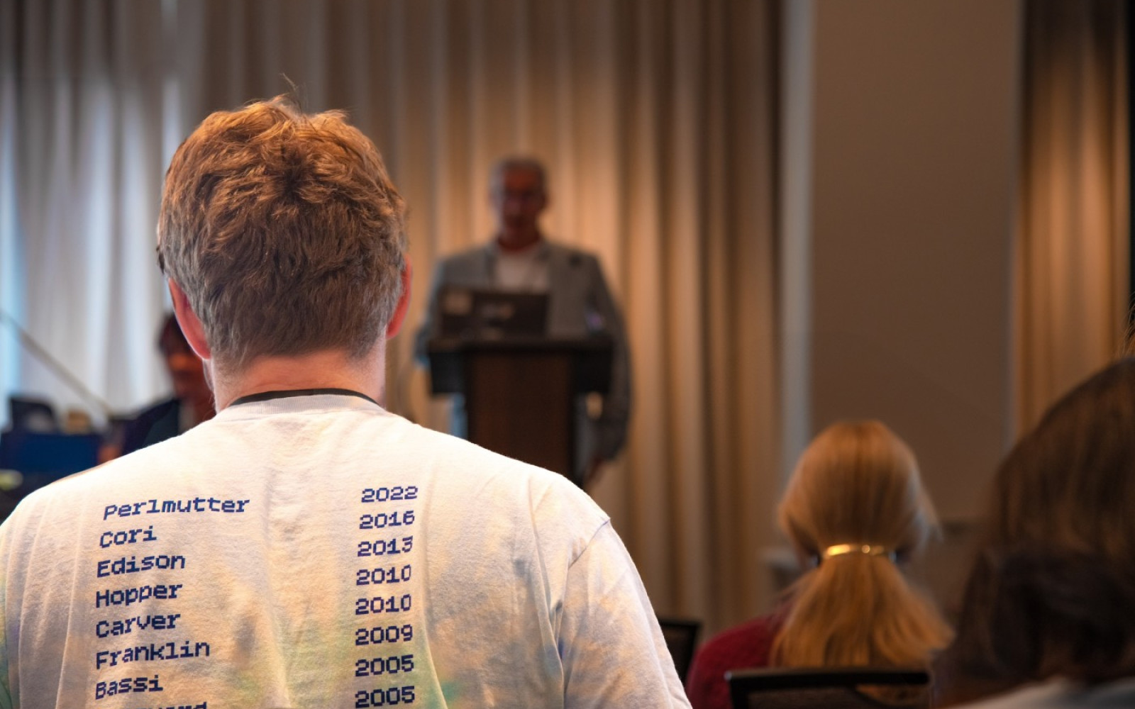 NUG 2024 systems t shirt in audience